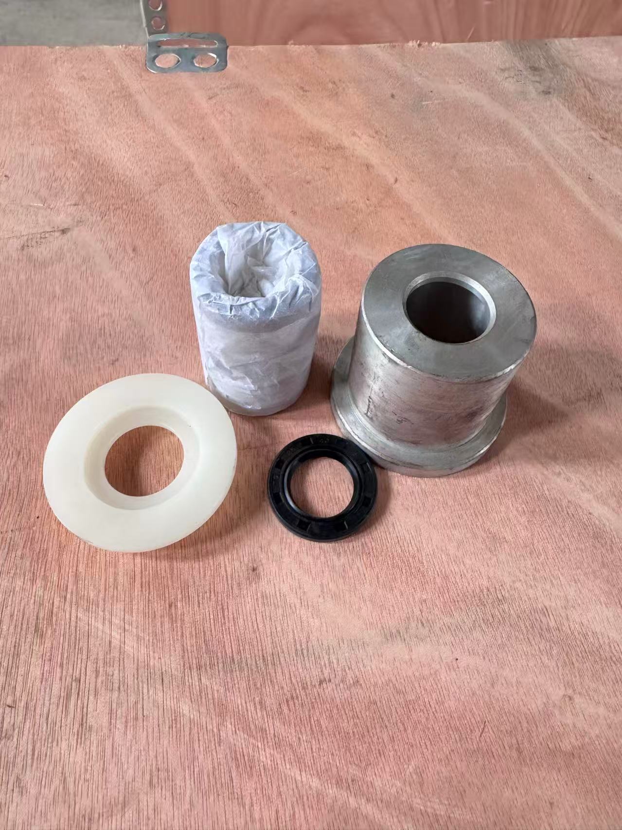 Seal, bush and sleeve components